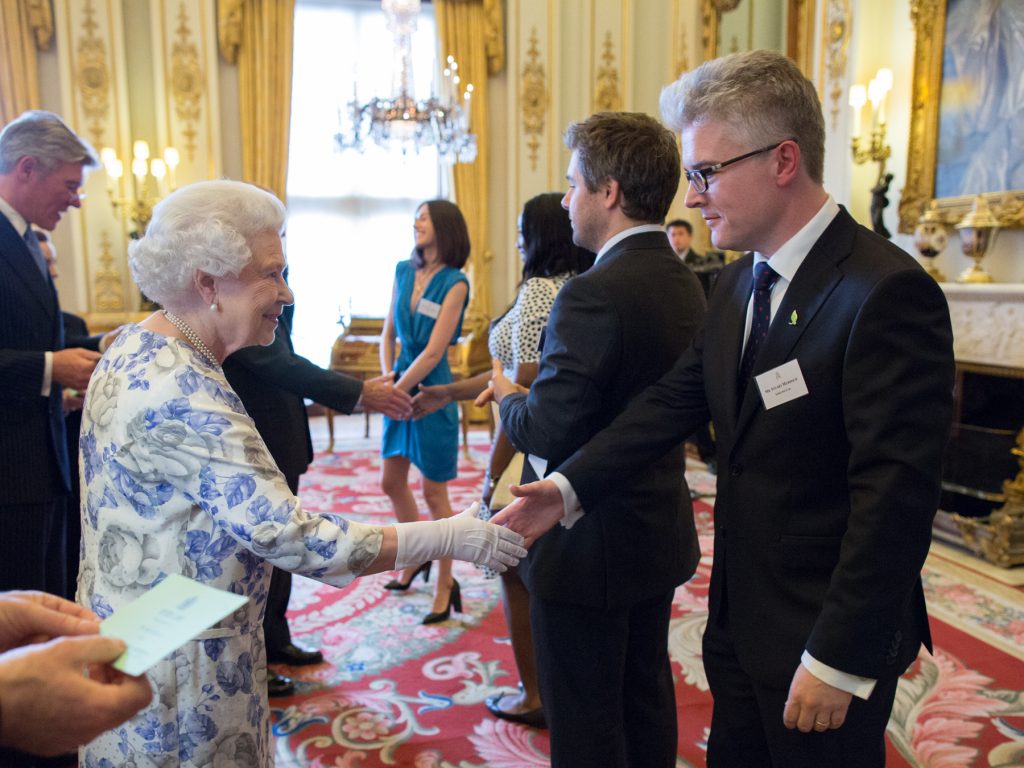 Stuart Murdoch (CEO) meeting Queen Elizabeth at Buckingham Palace